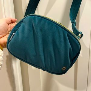 Emerald green and gold Lululemon everywhere belt bag